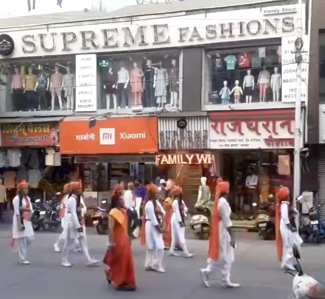 Hundreds of Durga Vahini members organized a military style street march holding guns and swords in Udaipur