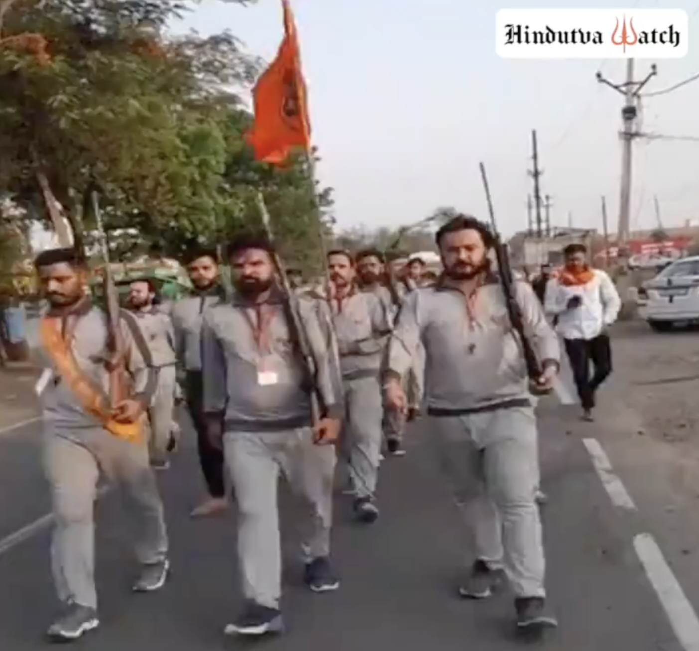 Bajrang Dal members organized military style march on streets holding guns and canes in Sehore