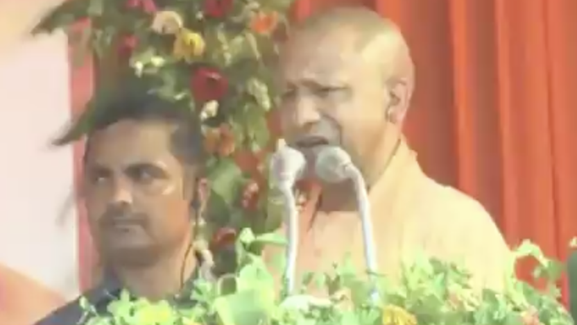 Durga Vahini member organize street march holding canes and swords in Fatehpur