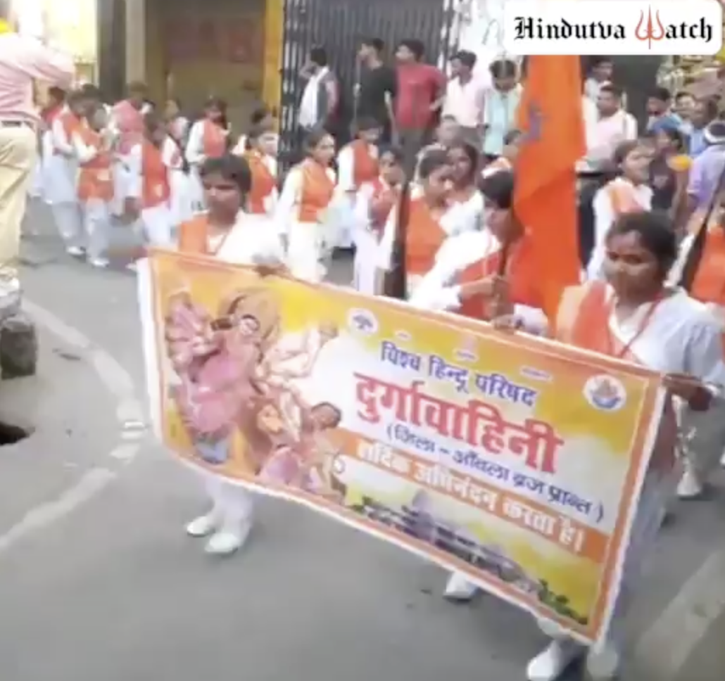 Durga Vahini members march on streets holding guns and a pistol in Barielly