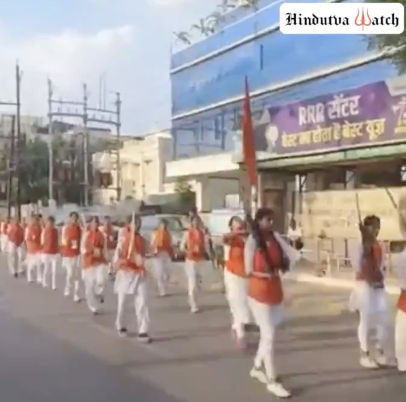 Durga Vahini members organized military style march brandishing guns, swords and sticks in Dwarka