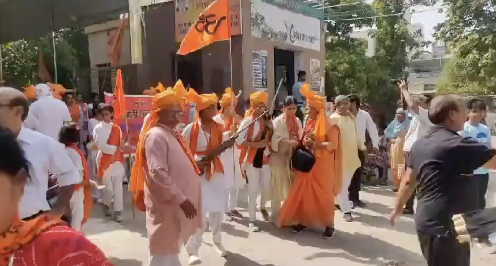 Durga Vahini members organized military style march brandishing guns and sticks in Faridabad