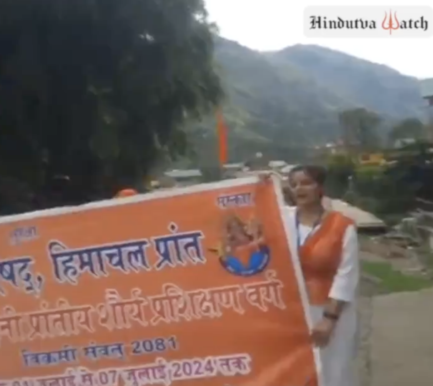 Durga Vahini members organized a military style parade and marched with guns and swords