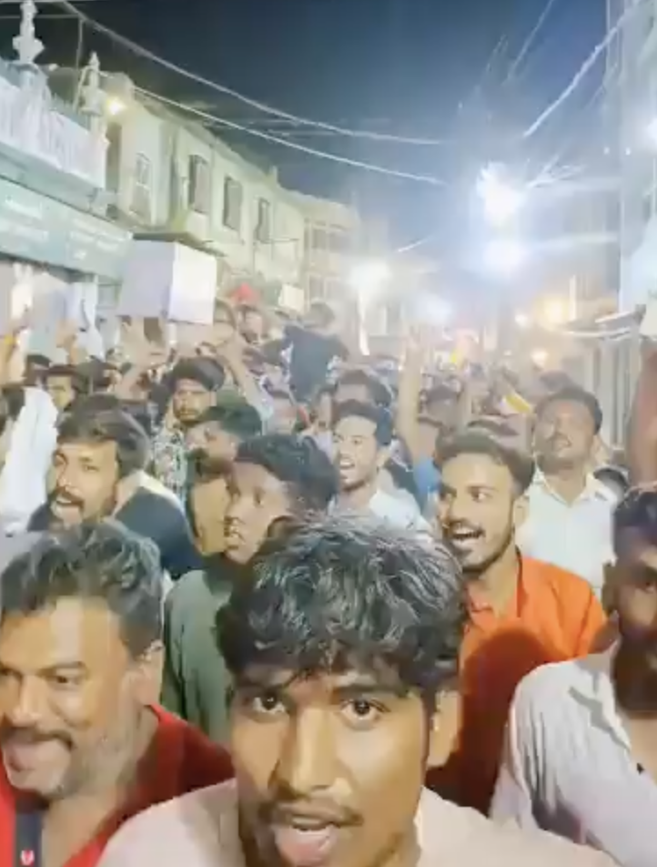 During Ganesh immersion procession, participants dancing to Hindutva pop directed imaginary arrow while passing through a mosque