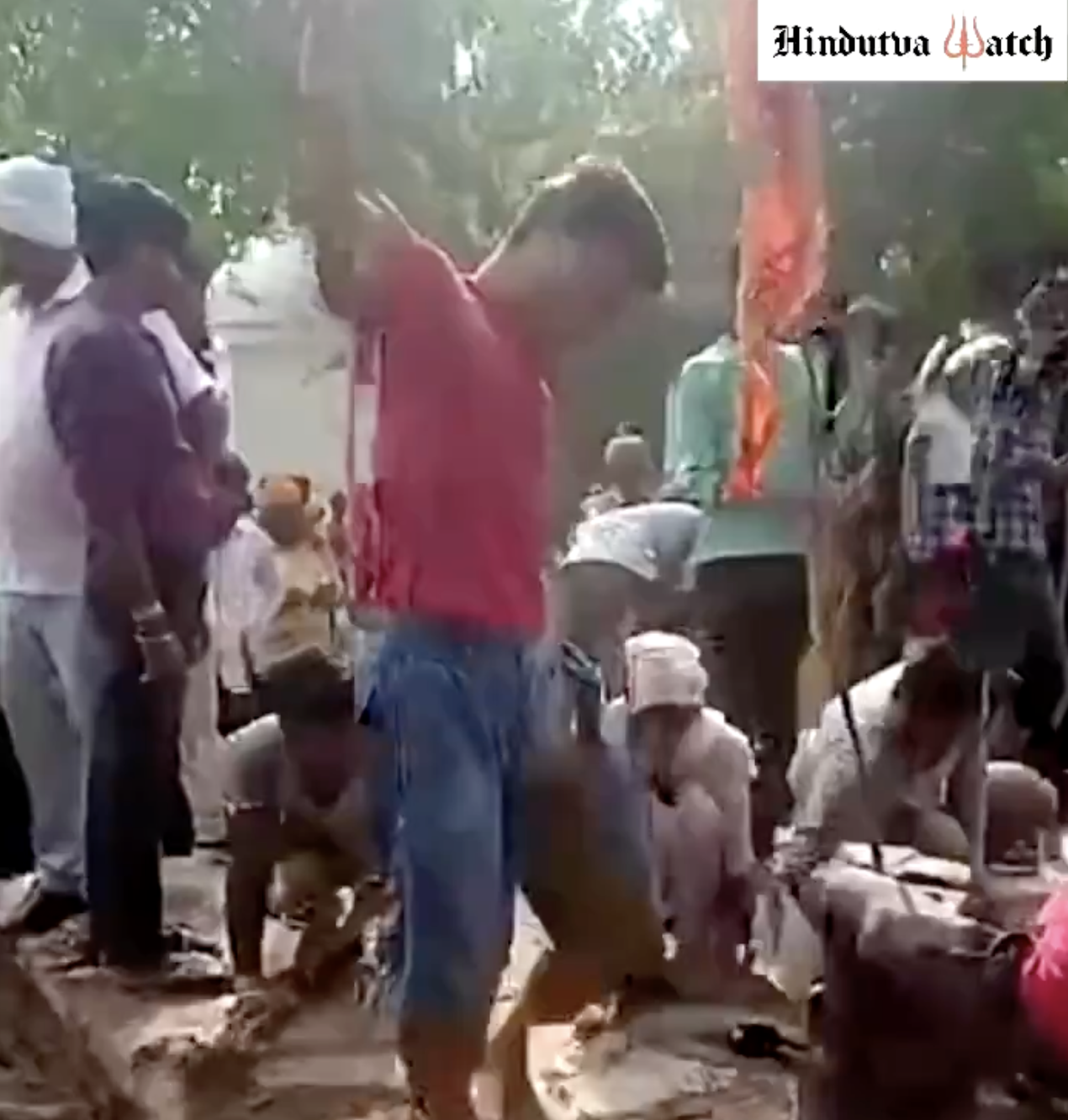 Mob of far-right Hindus led by a priest demolished a shrine, installed a saffron flag and symbol of god Shiva