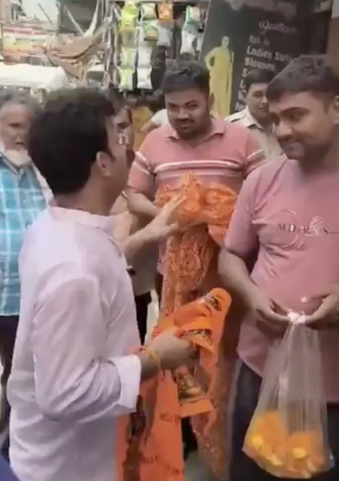 BJP Councilor Ravinder Singh Negi seen harassing Muslim shopkeepers in New Delhi