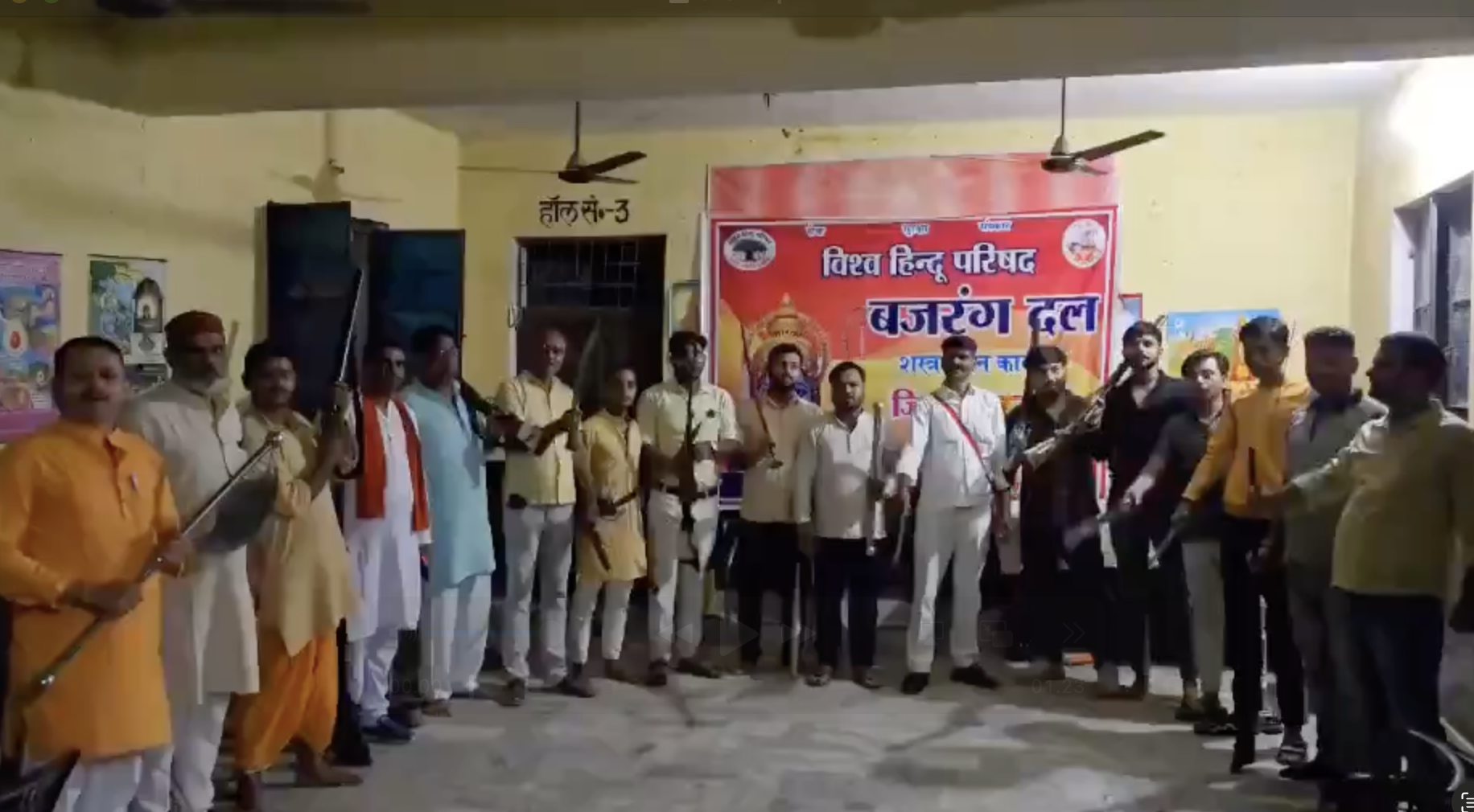 VHP-Bajrang Dal members march with rifles and swords