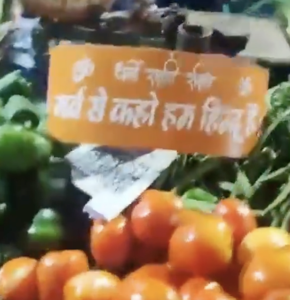 Far-right leader Raju Rawat led a campaign to distribute signboards to Hindu vegetable vendors
