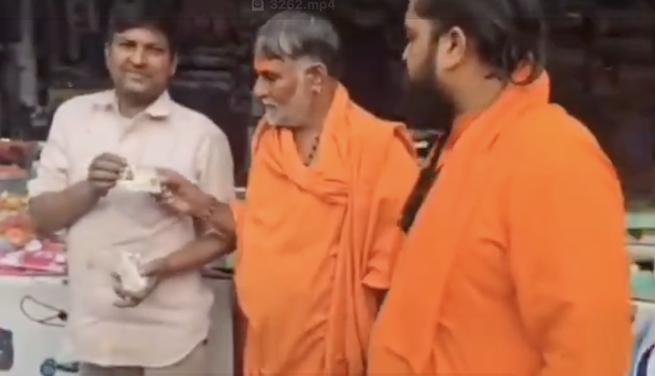 Far-right leader Swami Yashveer checks Aadhar cards of shopkeepers to identify and stop Muslims from setting up stalls