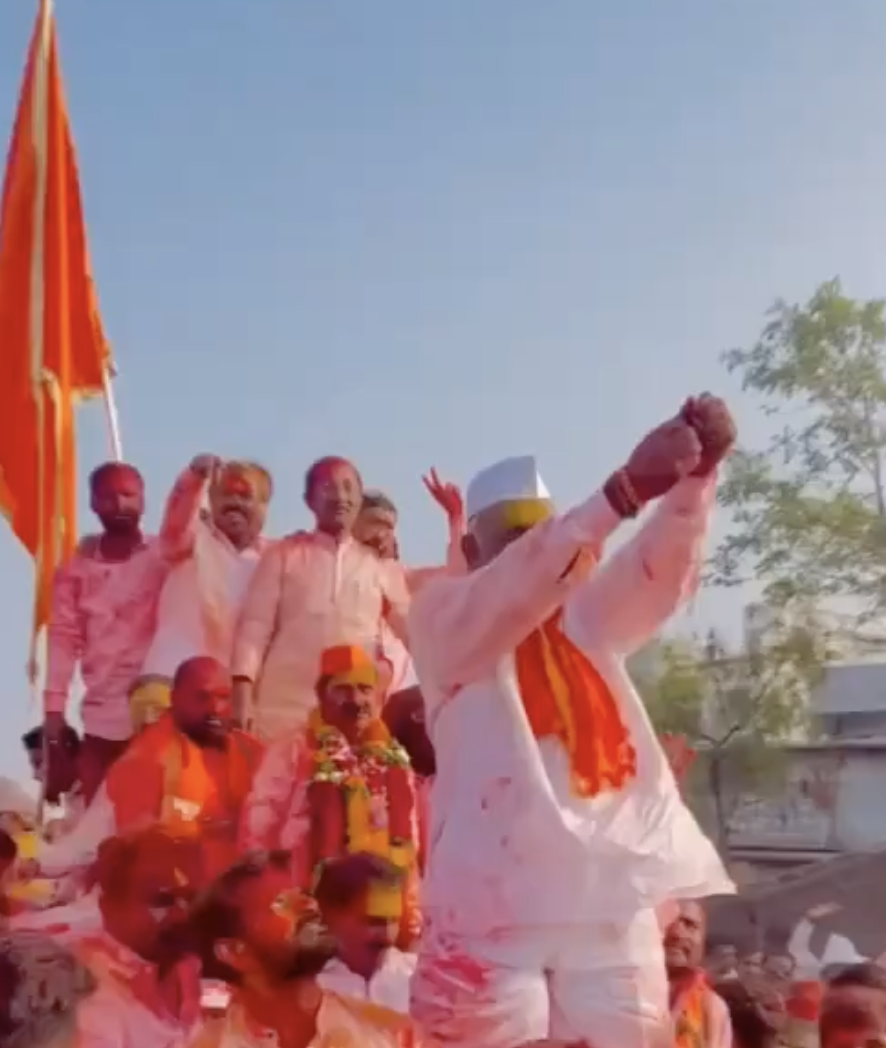 Far-right leader Pandit Dada Modak enacts act of shooting arrows at a mosque