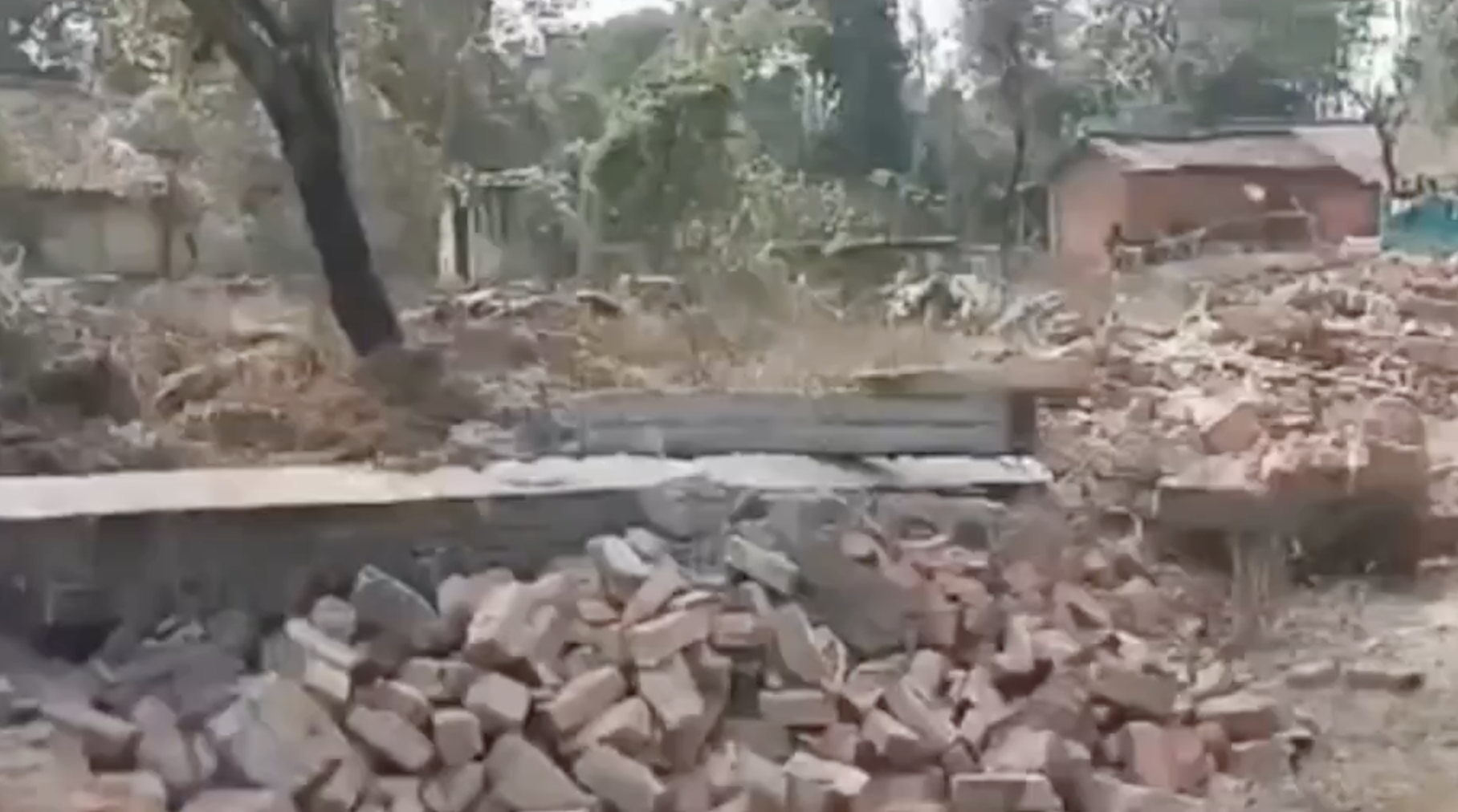 Authorities demolish structures in a predominantly Muslim settlement in Mauganj