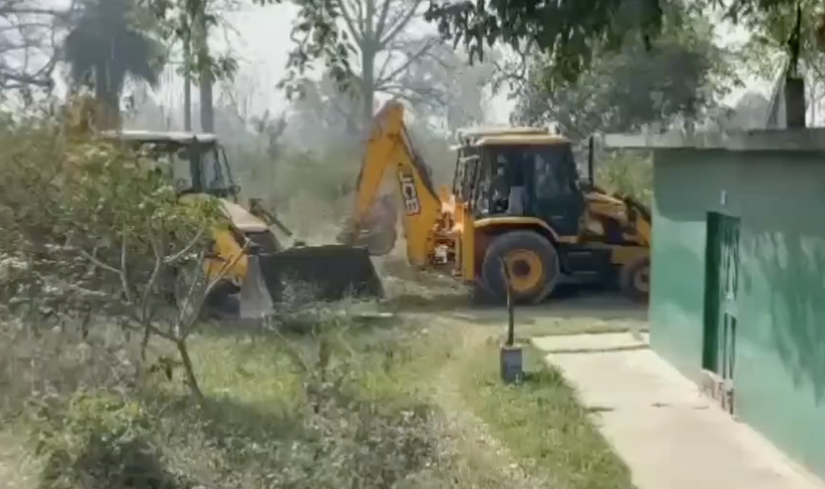 District Bulldozes Mazar, Citing Illegal Construction on Government Land