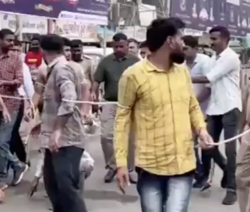 In Godhra, police parade Muslim protestors tied with ropes after riots