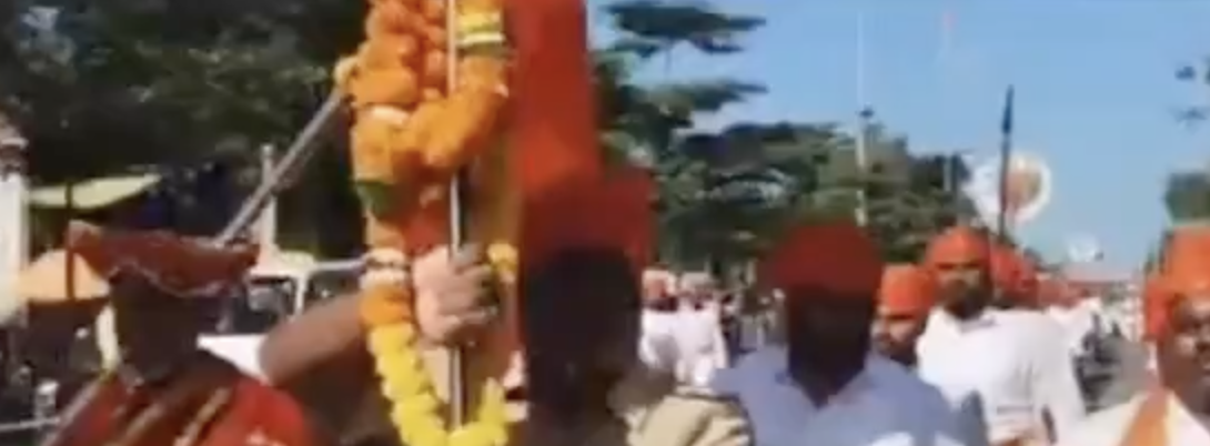 In Maharashtra, children pose with trishuls during Shastra Pooja photo op